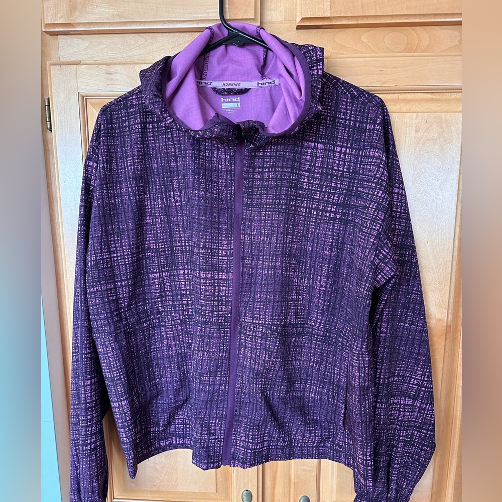 Hind running jacket, purple and black design.